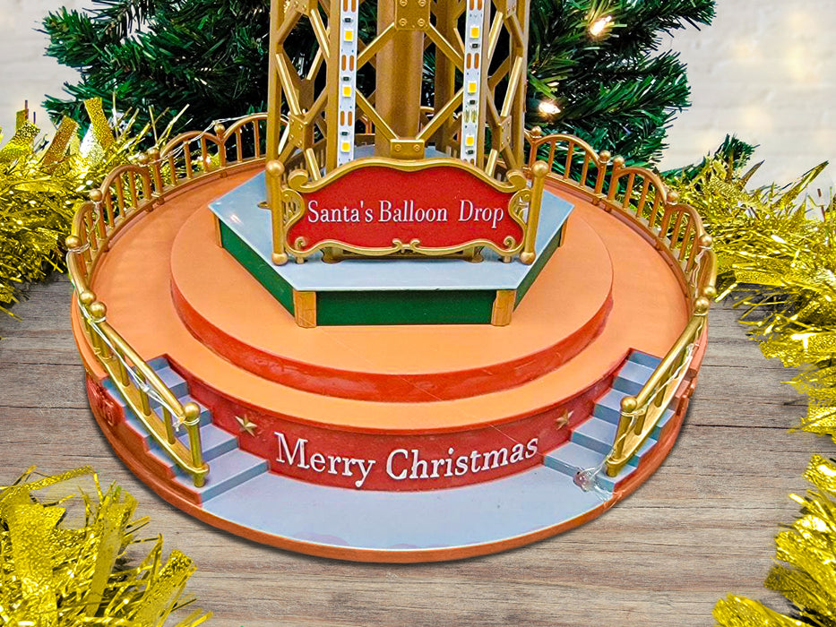 Christmas Parachute Tower. Animated Christmas Village F07M4-8-W201 Christmas Carousel