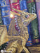 The Moth Hunters K-266 Counted Cross-Stitch Kit with two dragons on the bookshelf